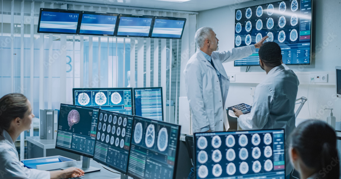 Group of medical professionals looking at the brain scan results