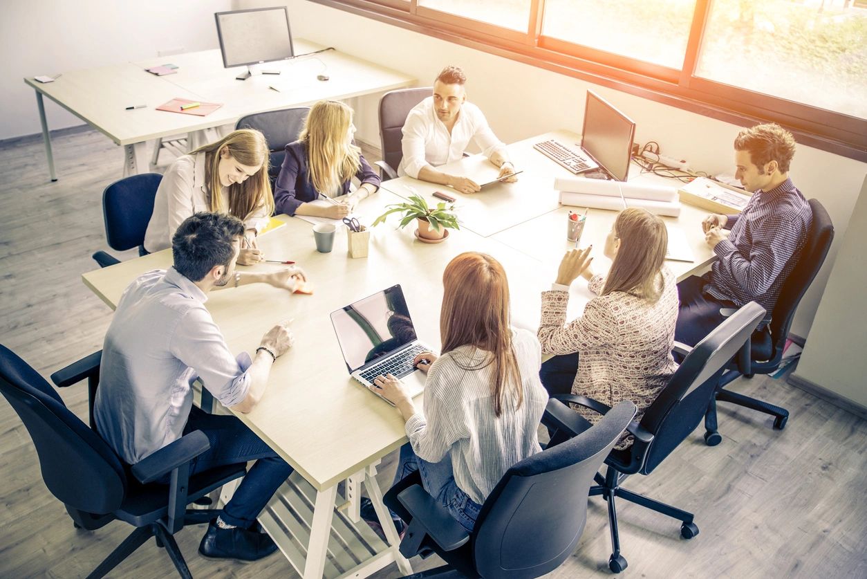 A group of people during the meeting